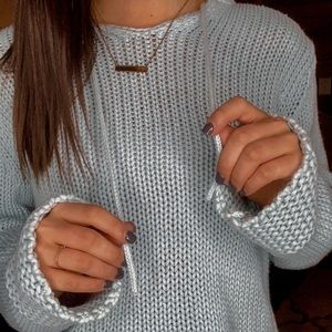 Knitted blue hoodie pullover